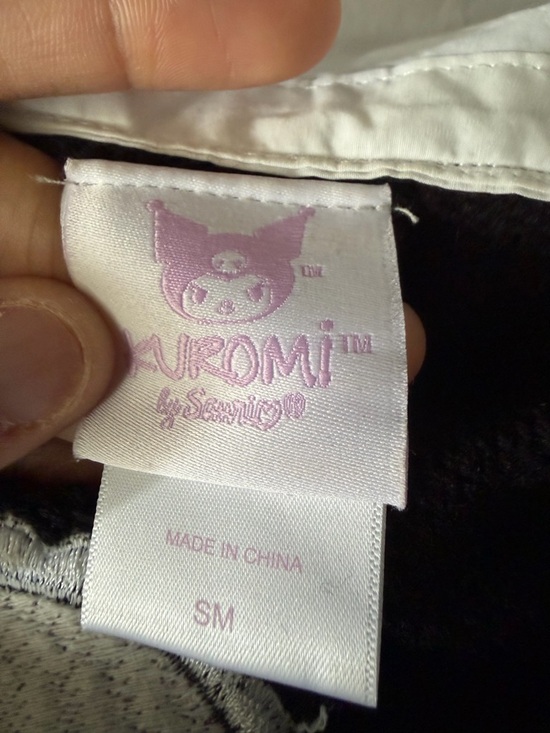 Sanrio black sweater cardigan with pink and purple accents - Picture 3 of 3